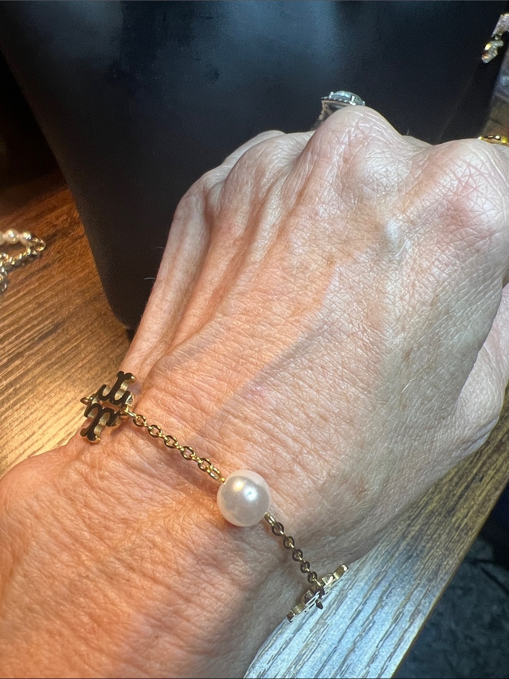 Gold Chain Bracelet with Pearl Accent and Logo Motifs